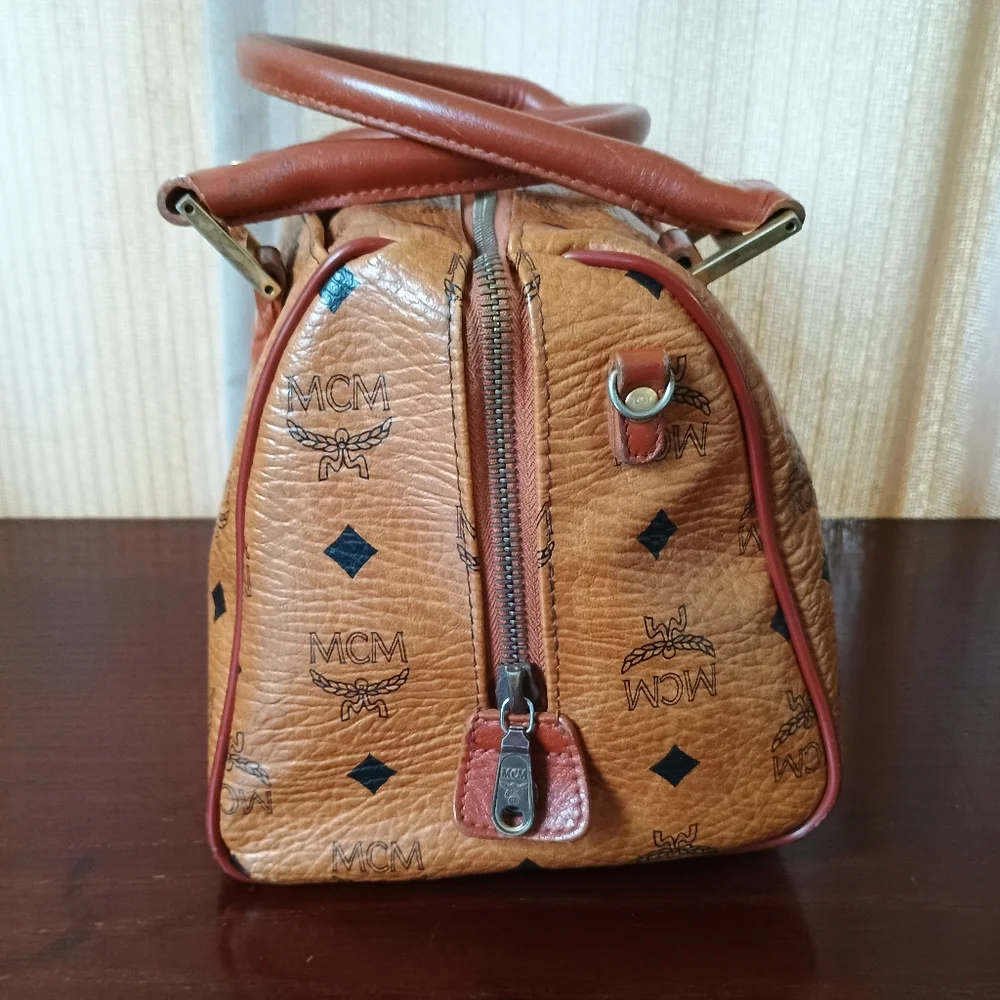 MCM Cognac Brown Monogram Handbag with Black Diamond Motif and Gold Hardware